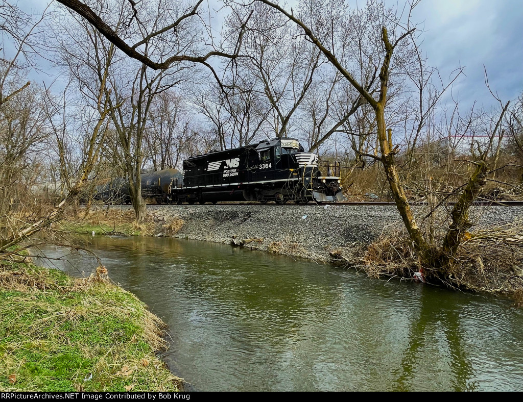 Train symbol H75 alongside Monocacy Creek in Archibald Johnson Conservation Area